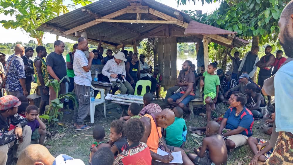 Community outreach and environmental education session at rural village shelter by the riverside